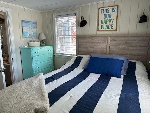 242 Old Wharf Road, Unit F7 Dennis Port, MA 02639 - Photo 26 of 48 a bedroom with a bed and a window