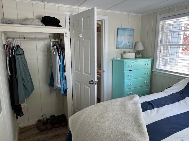 242 Old Wharf Road, Unit F7 Dennis Port, MA 02639 - Photo 27 of 48 a bedroom with a bed and a window
