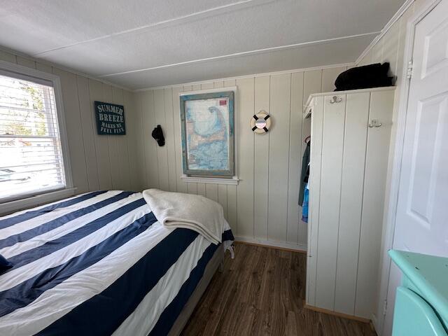 242 Old Wharf Road, Unit F7 Dennis Port, MA 02639 - Photo 28 of 48 a bedroom with a bed and a window