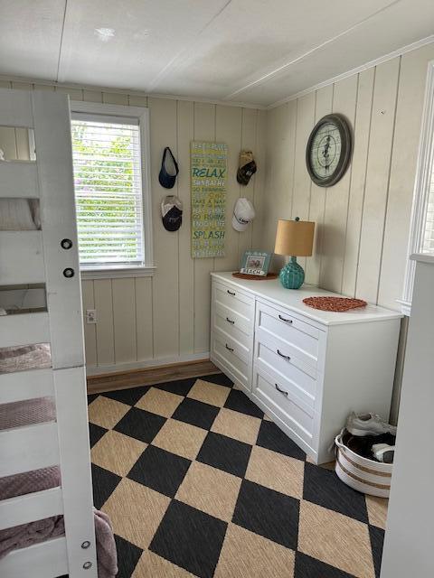 242 Old Wharf Road, Unit F7 Dennis Port, MA 02639 - Photo 31 of 48 a room with a black white checkered floor with a large mirror and a sink