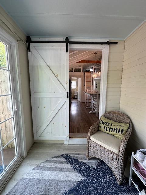 242 Old Wharf Road, Unit F7 Dennis Port, MA 02639 - Photo 35 of 48 a view of a bedroom with wooden floor and a ceiling fan