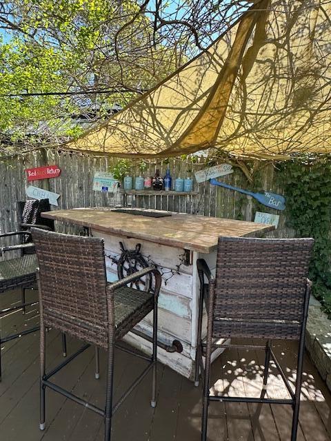 242 Old Wharf Road, Unit F7 Dennis Port, MA 02639 - Photo 42 of 48 a view of a chairs and table in the patio