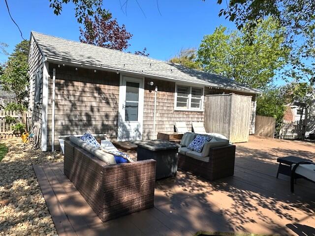 242 Old Wharf Road, Unit F7 Dennis Port, MA 02639 - Photo 6 of 48 a outdoor living space with patio furniture and garden