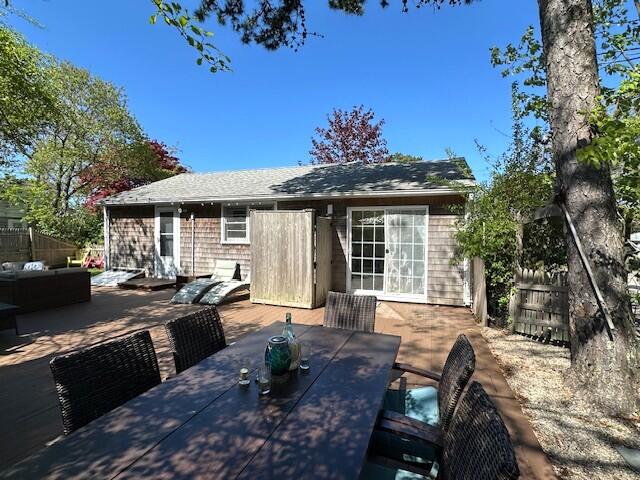 242 Old Wharf Road, Unit F7 Dennis Port, MA 02639 - Photo 7 of 48 a front view of a house with patio