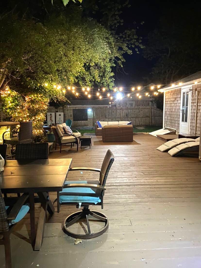 242 Old Wharf Road, Unit F7 Dennis Port, MA 02639 - Photo 9 of 48 a view of a swimming pool with seating area and furniture