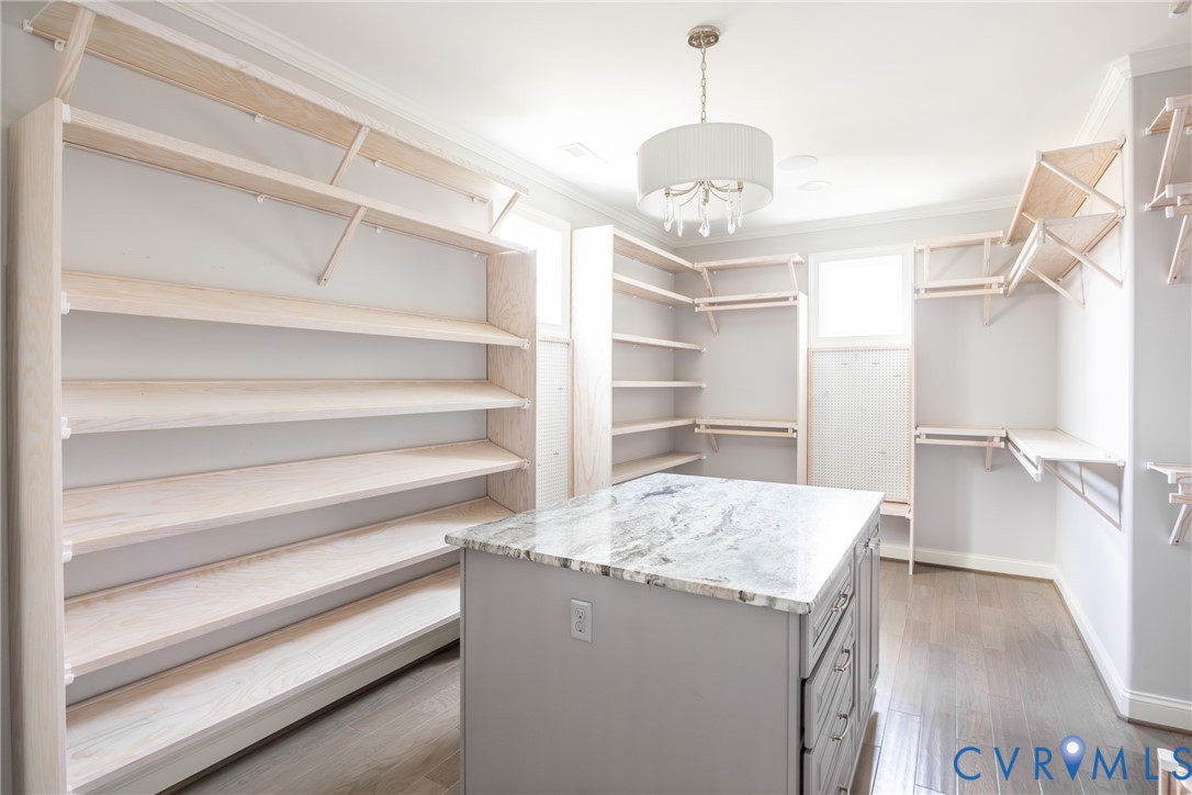 16136 Old Castle Road Midlothian, VA 23112 - Photo 39 of 76 Huge primary closet with center island and multipl