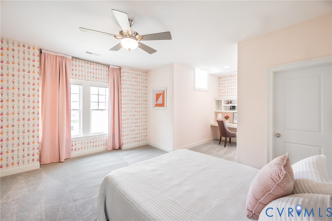 16136 Old Castle Road Midlothian, VA 23112 - Photo 41 of 76 Large bedroom with built-in desk and motorized bli