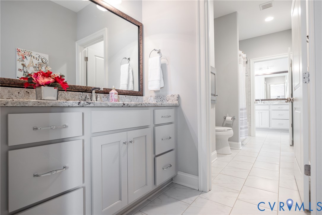 16136 Old Castle Road Midlothian, VA 23112 - Photo 44 of 76 Jack and Jill bathroom with laundry chute