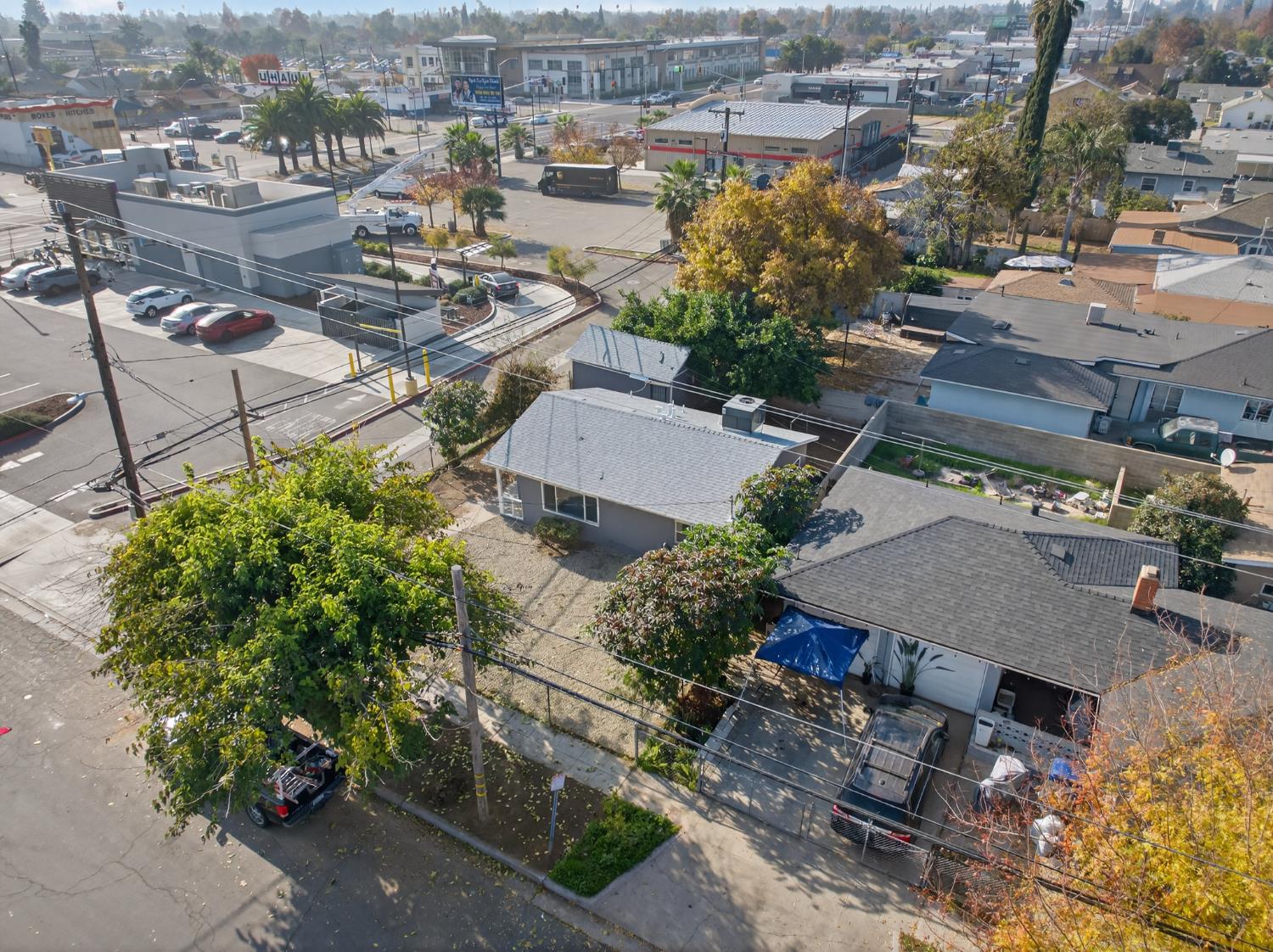 622 South 11th Street Fresno, CA 93702 - Photo 14 of 37 an aerial view of a house with a yard and lake view