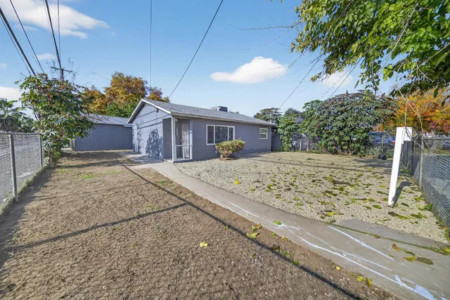 a view of a house with a snow on the road