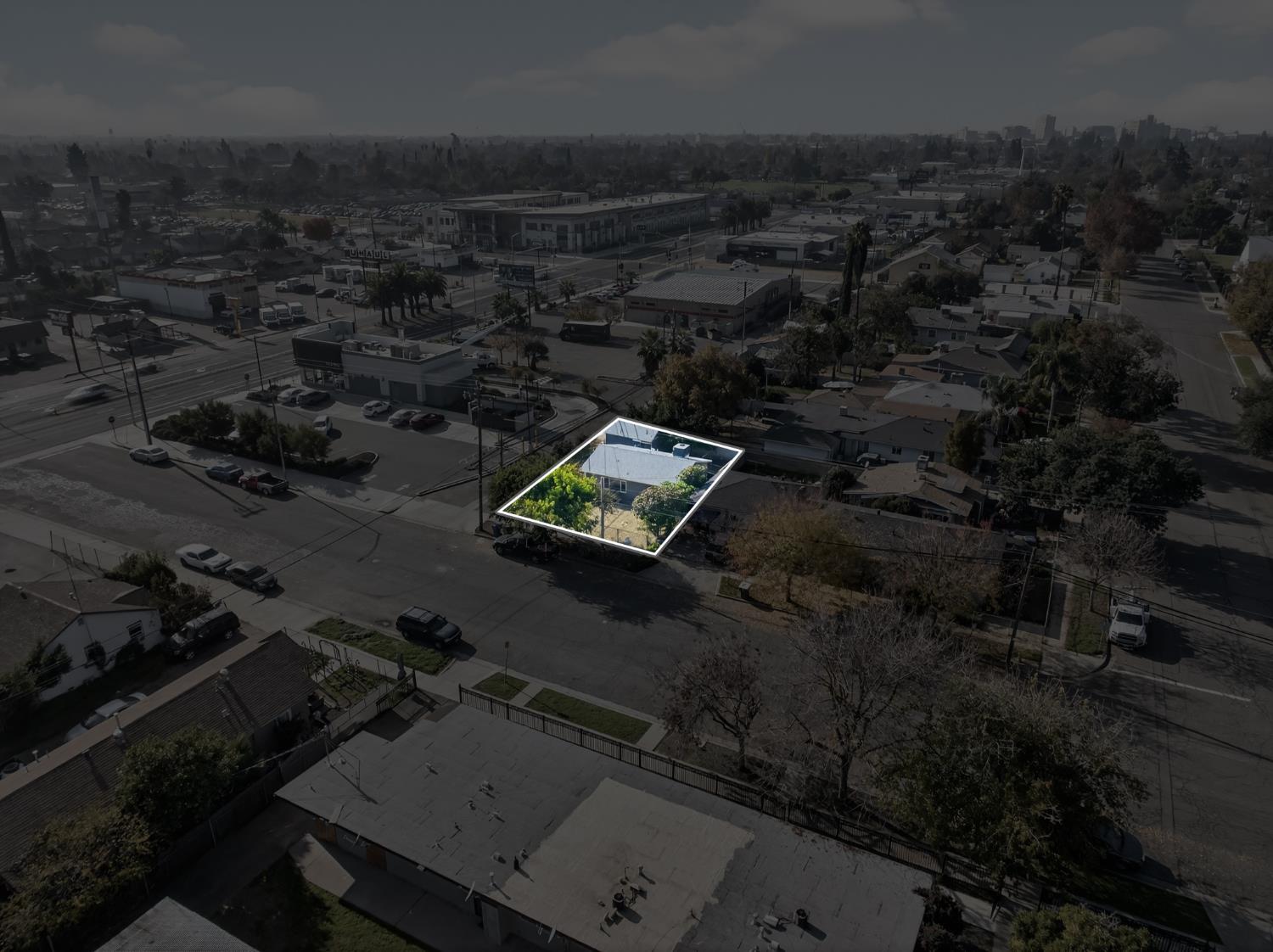 622 South 11th Street Fresno, CA 93702 - Photo 7 of 37 an aerial view of residential house with parking space