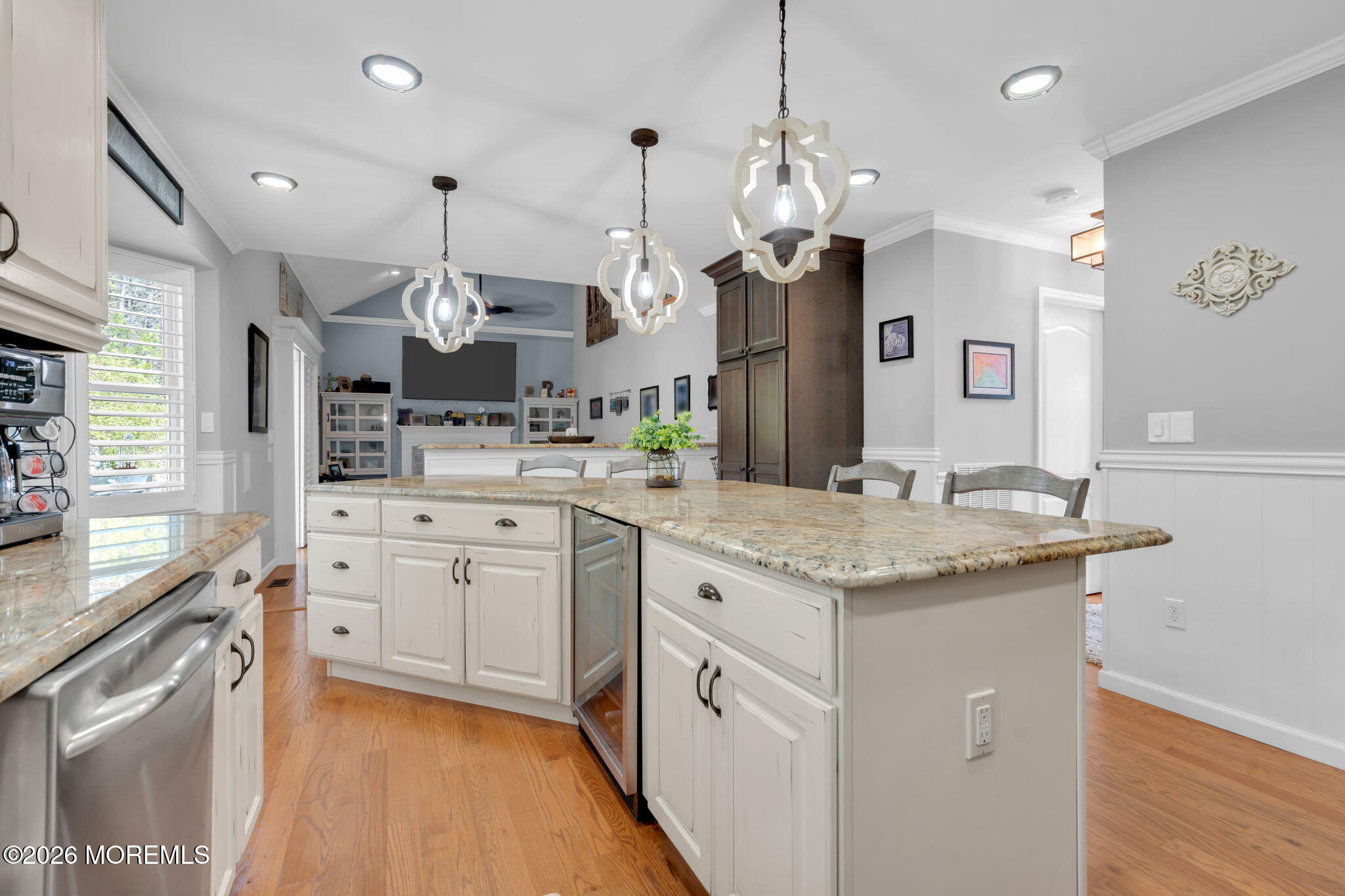 9 Eagle Ridge Lane West Creek, NJ 08092 - Photo 14 of 55 a kitchen with stainless steel appliances kitchen island granite countertop a sink a stove and a refrigerator