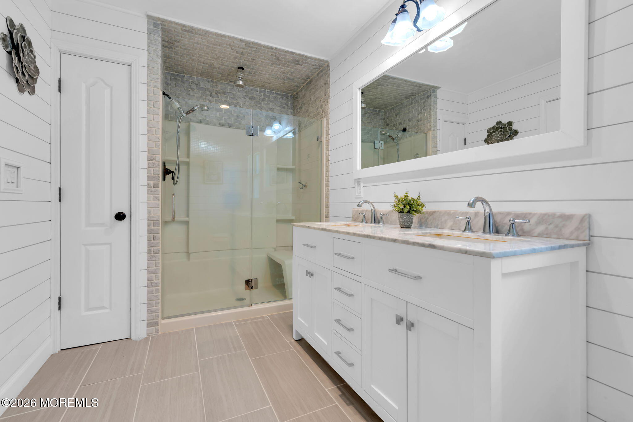 9 Eagle Ridge Lane West Creek, NJ 08092 - Photo 23 of 55 a bathroom with a sink a shower and a mirror