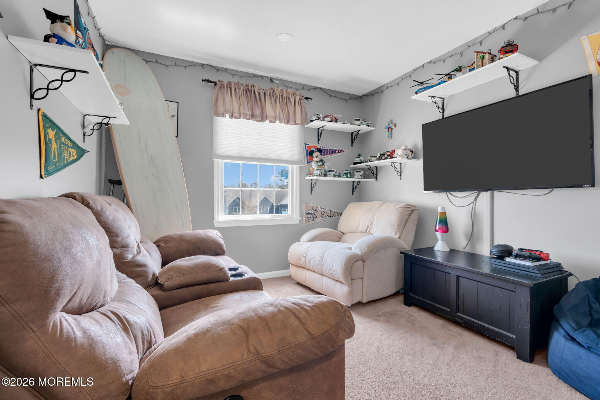 9 Eagle Ridge Lane West Creek, NJ 08092 - Photo 26 of 55 a living room with furniture and a flat screen tv