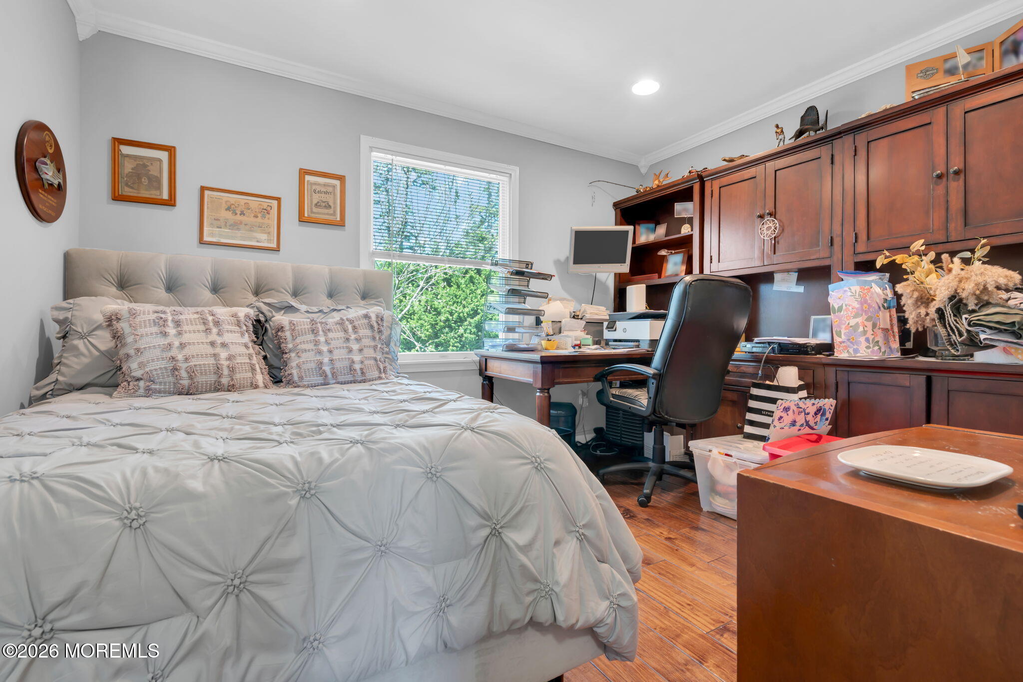 9 Eagle Ridge Lane West Creek, NJ 08092 - Photo 27 of 55 a bedroom with a bed a desk and chair with a bookshelf