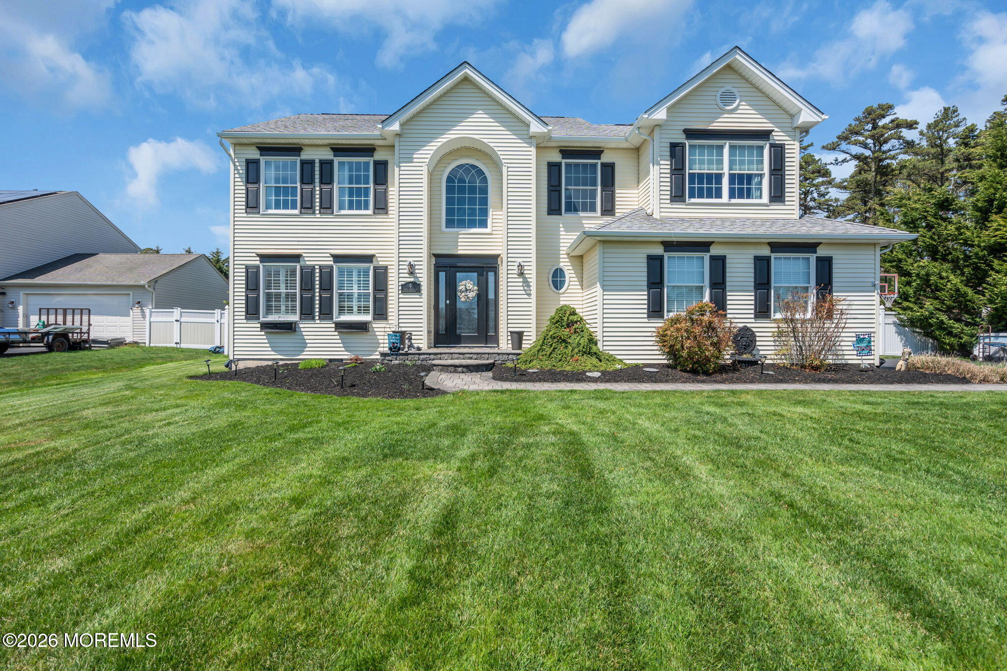9 Eagle Ridge Lane West Creek, NJ 08092 - Photo 43 of 55 a front view of a house with a yard and trees