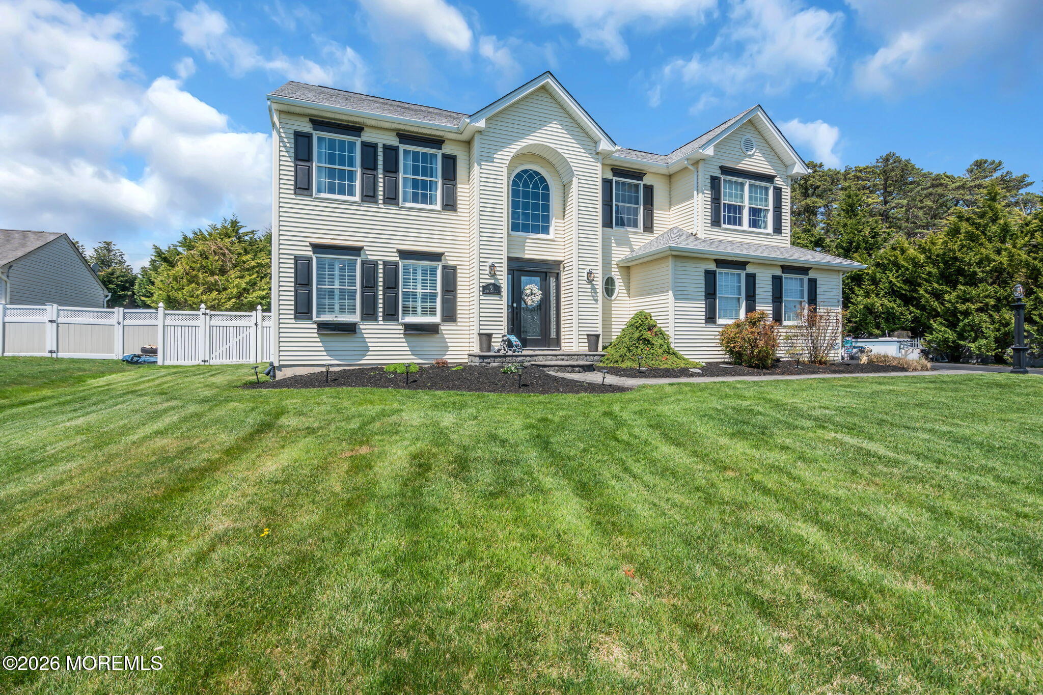 9 Eagle Ridge Lane West Creek, NJ 08092 - Photo 44 of 55 a front view of a house with a yard and trees