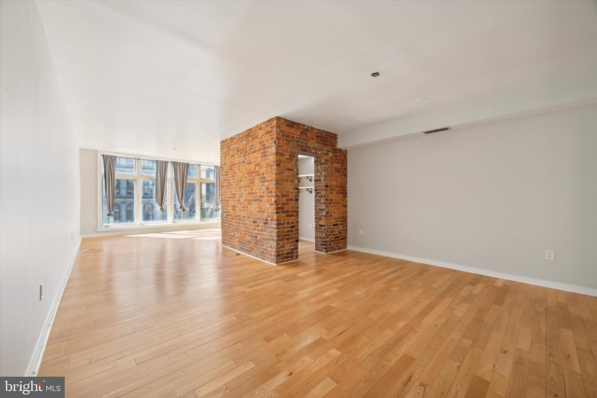 222 Church Street, Unit 3F Philadelphia, PA 19106 - Photo 5 of 19 a view of an empty room with glass door