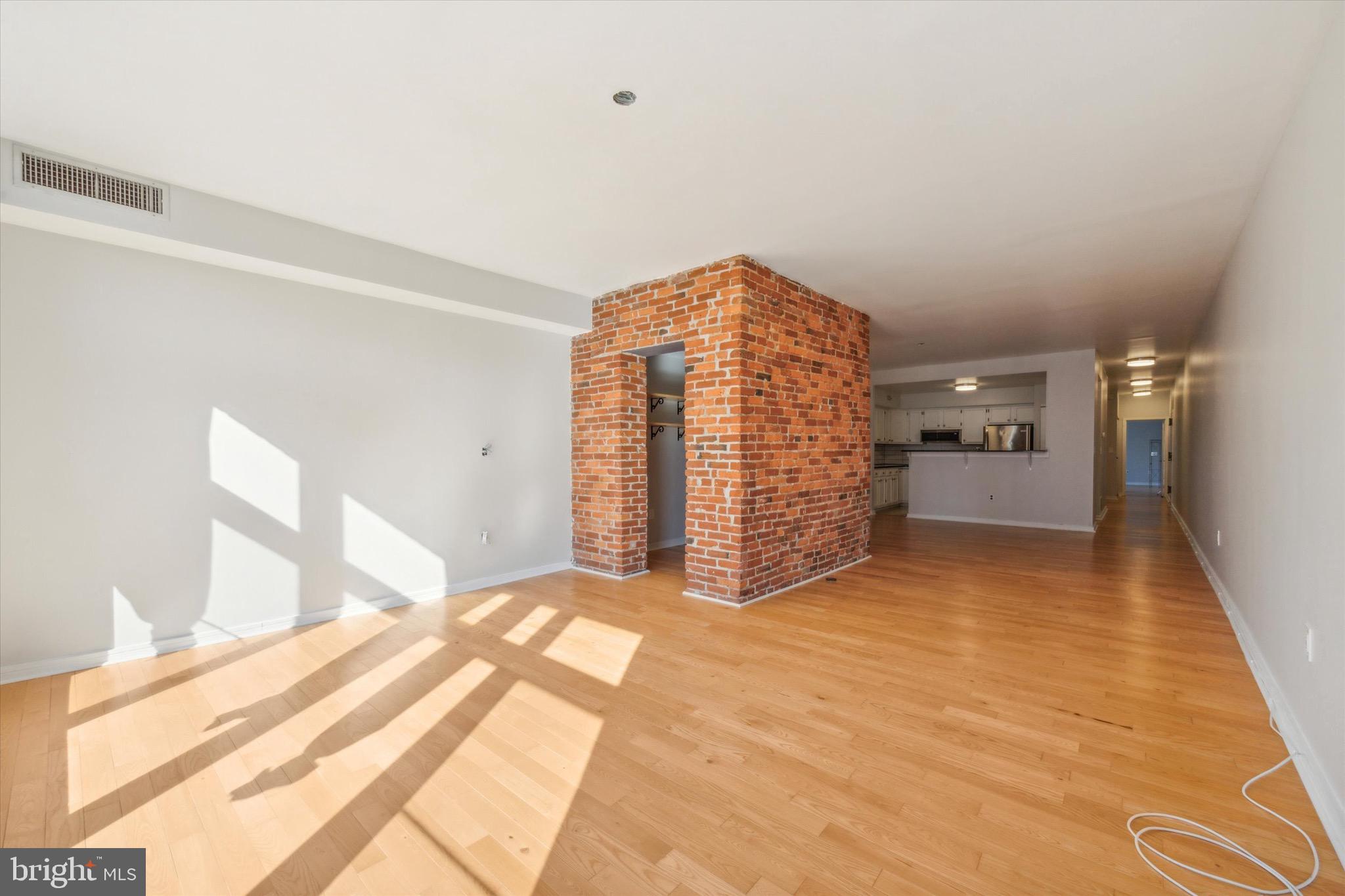 222 Church Street, Unit 3F Philadelphia, PA 19106 - Photo 6 of 19 a view of an empty room with a fireplace