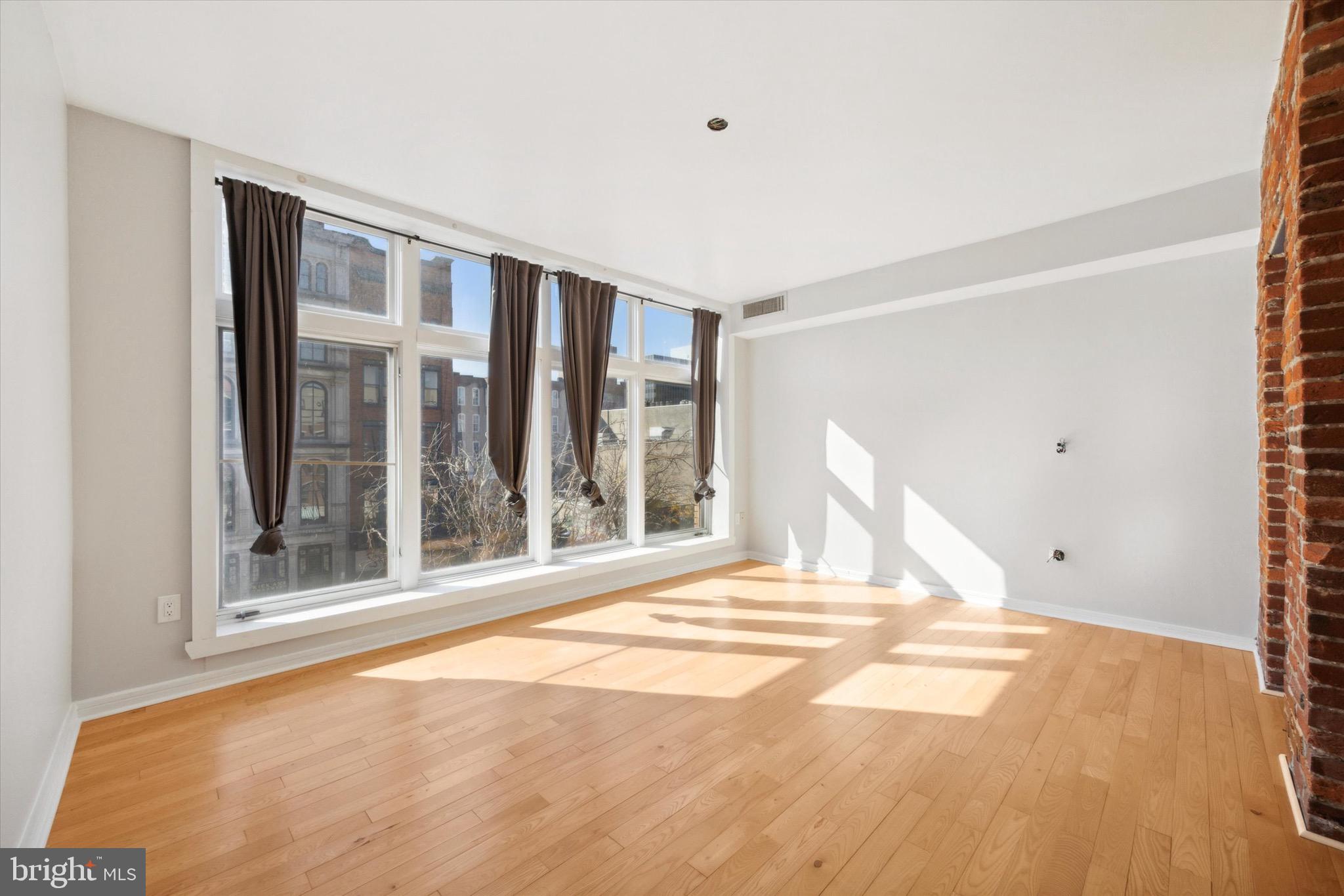 222 Church Street, Unit 3F Philadelphia, PA 19106 - Photo 7 of 19 a view of an empty room with a window