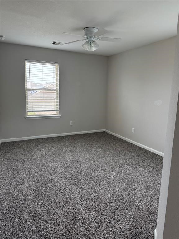2818 Mezzomonte Lane League City, TX 77573 - Photo 11 of 13 an empty room with a window