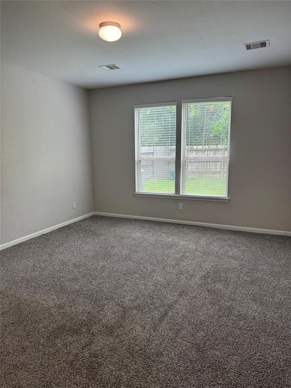 2818 Mezzomonte Lane League City, TX 77573 - Photo 6 of 13 an empty room with a window