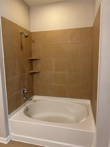 a bathroom with a bathtub