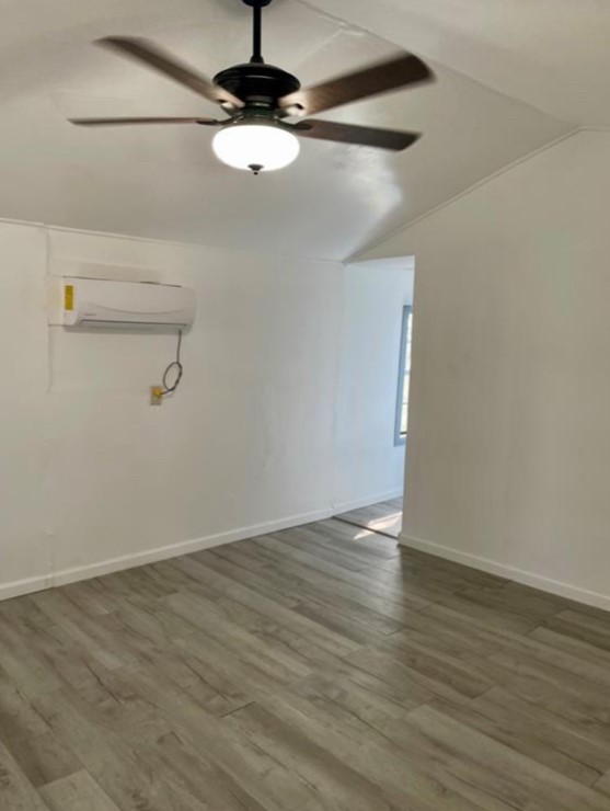 516 Sodville Street Sinton, TX 78387 - Photo 9 of 11 a view of an empty room with wooden floor