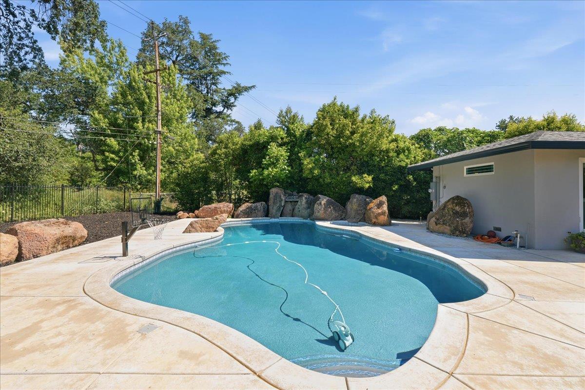 4849 Alexon Way Carmichael, CA 95608 - Photo 42 of 50 a view of a swimming pool with a patio