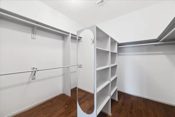 a view of an empty walk in closet