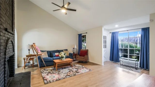 a living room with furniture and a rug