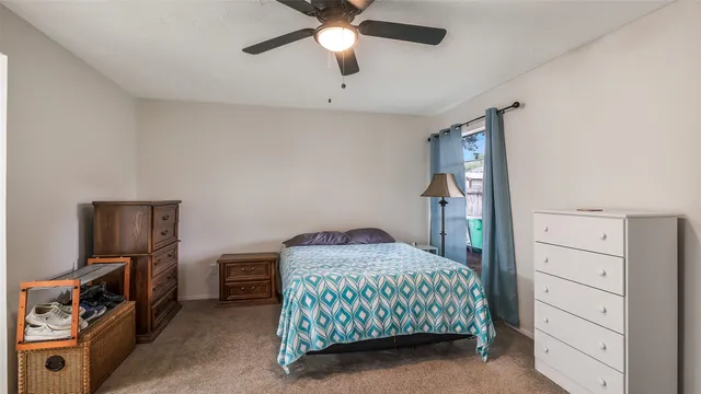 a bedroom with a bed and furniture
