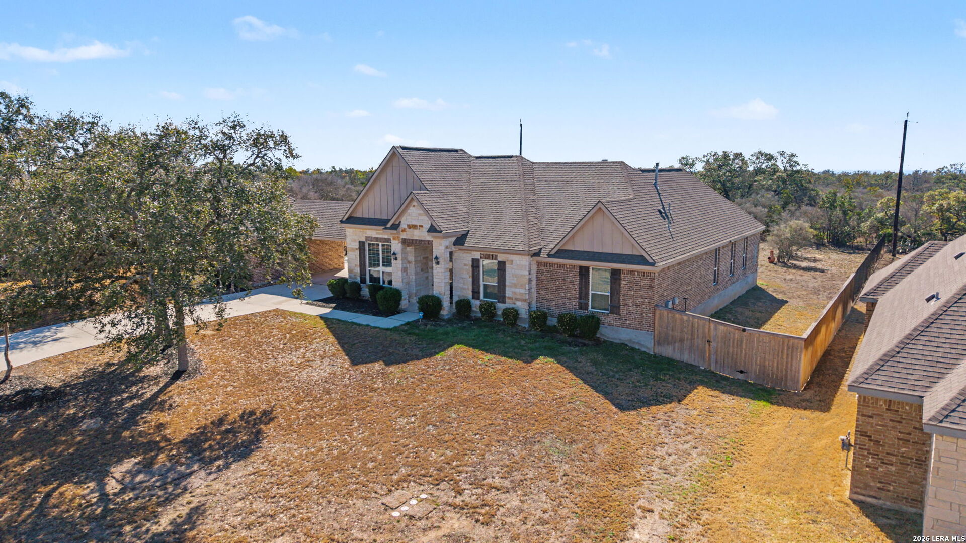 269 Big Bend Path Castroville, TX 78009 - Photo 5 of 42 a view of a house with a yard