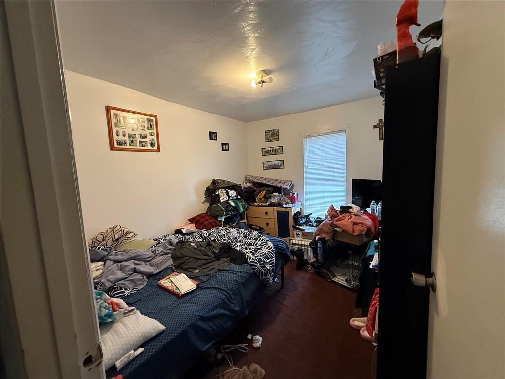 420 Negley Avenue Butler, PA 16001 - Photo 11 of 15 a bedroom with bed and a closet