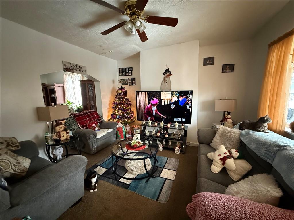 420 Negley Avenue Butler, PA 16001 - Photo 4 of 15 a living room with furniture and a window