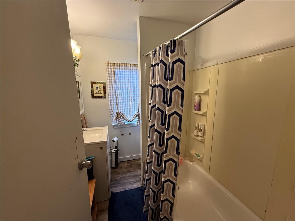 420 Negley Avenue Butler, PA 16001 - Photo 8 of 15 a bathroom with a shower and a shower curtain