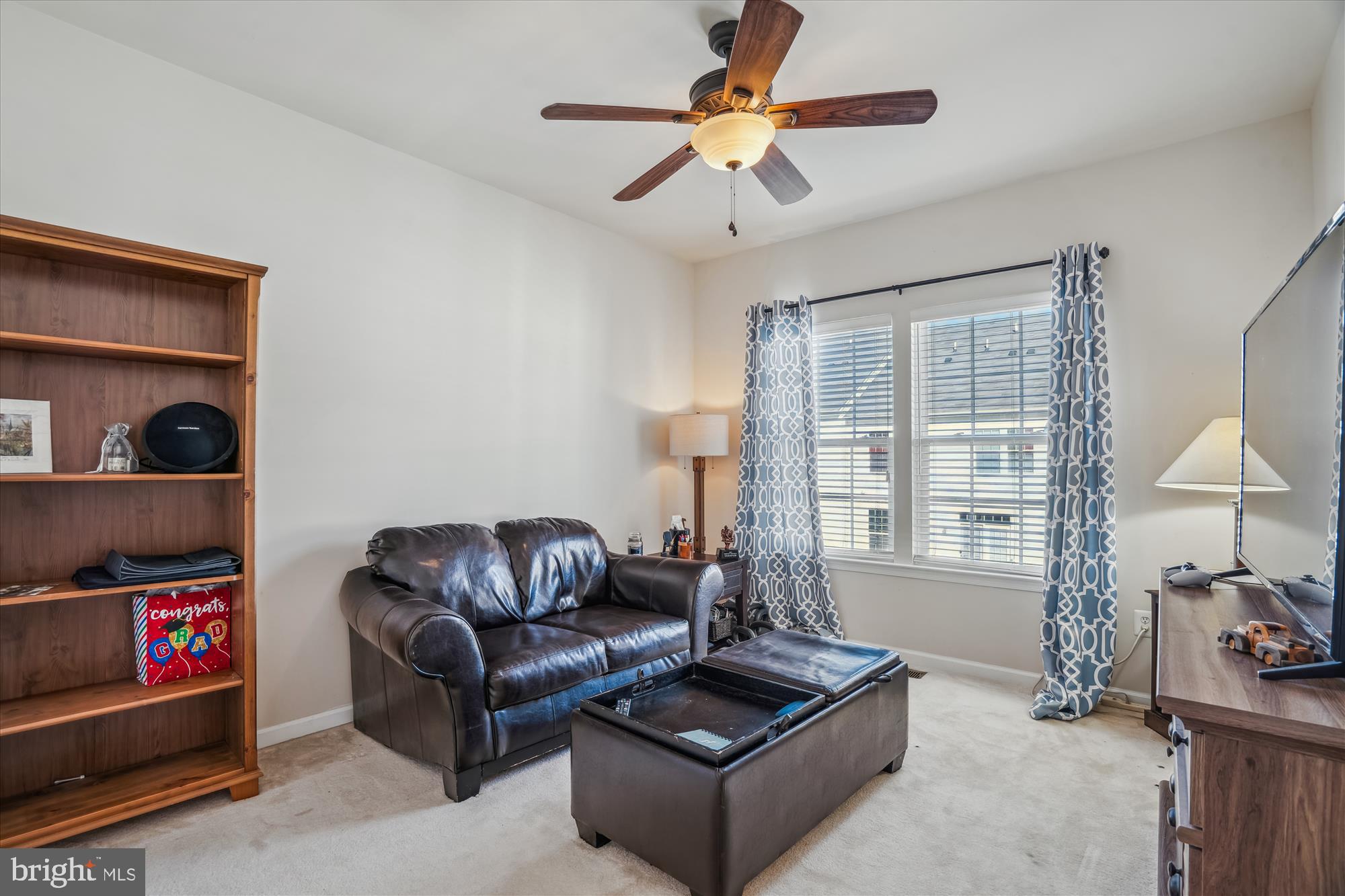 910 Hall Station Drive, Unit 202 Bowie, MD 20721 - Photo 31 of 44 a living room with furniture and a window