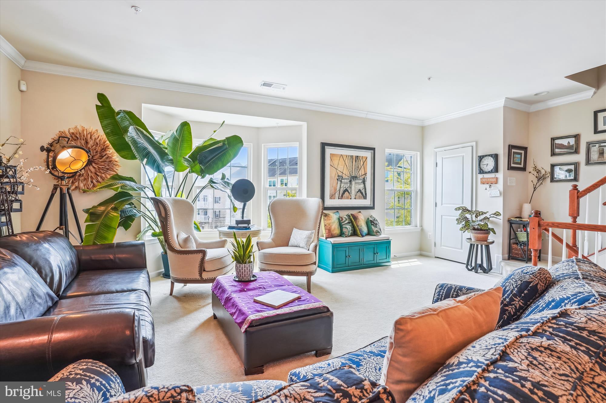 910 Hall Station Drive, Unit 202 Bowie, MD 20721 - Photo 4 of 44 a living room with furniture a rug and a window