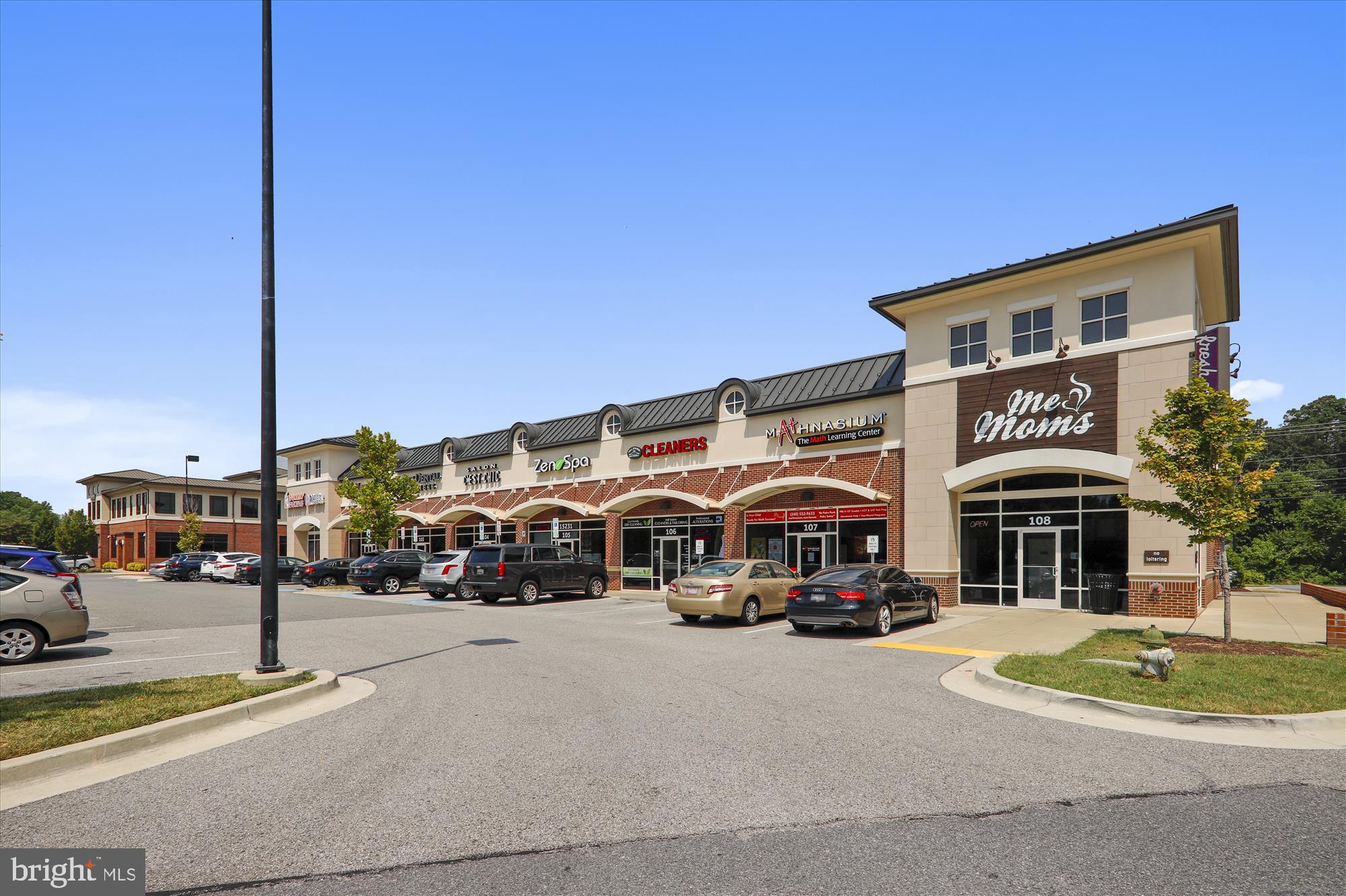 910 Hall Station Drive, Unit 202 Bowie, MD 20721 - Photo 43 of 44 a couple of cars parked in front of building