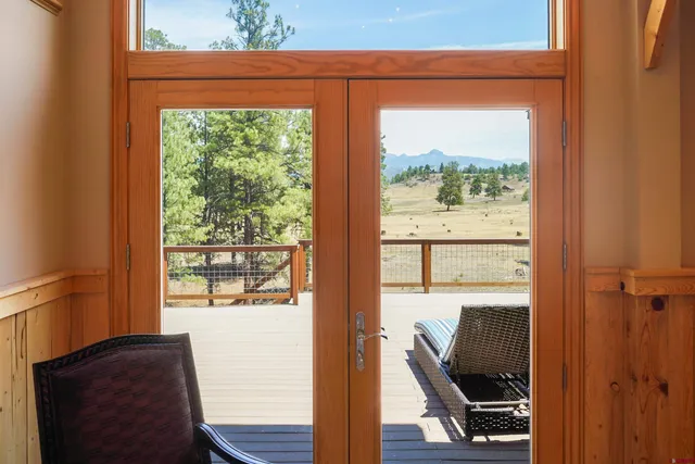 a view of a room with a large window