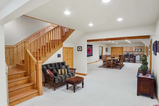 a view of a living room with furniture