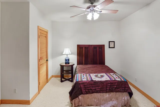 a utility room with cabinets washer and dryer