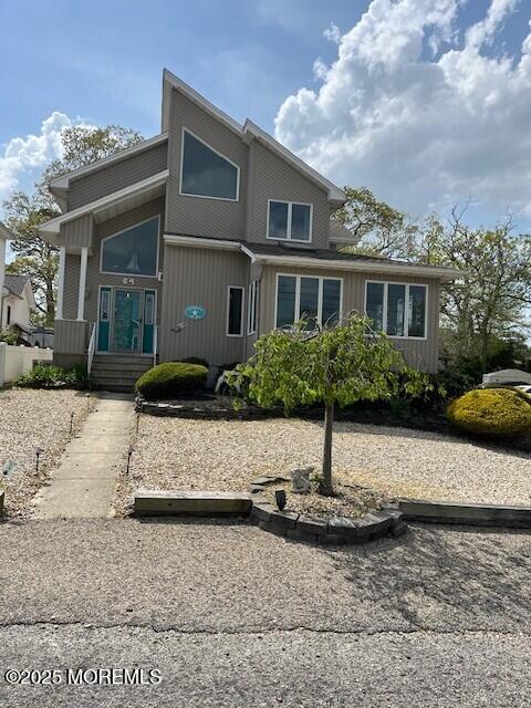 a front view of a house with yard