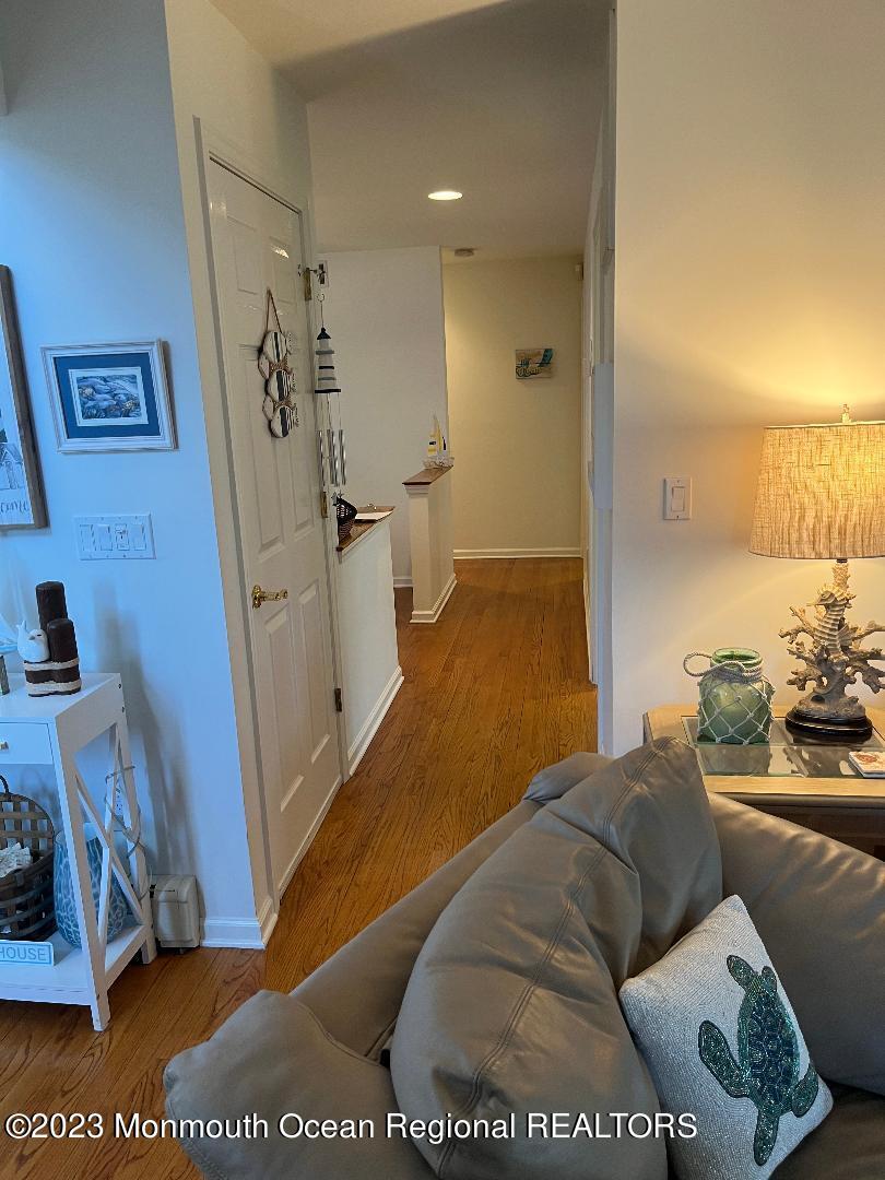 64 Van Ness Drive Brick, NJ 08723 - Photo 11 of 25 a living room with furniture and a rug