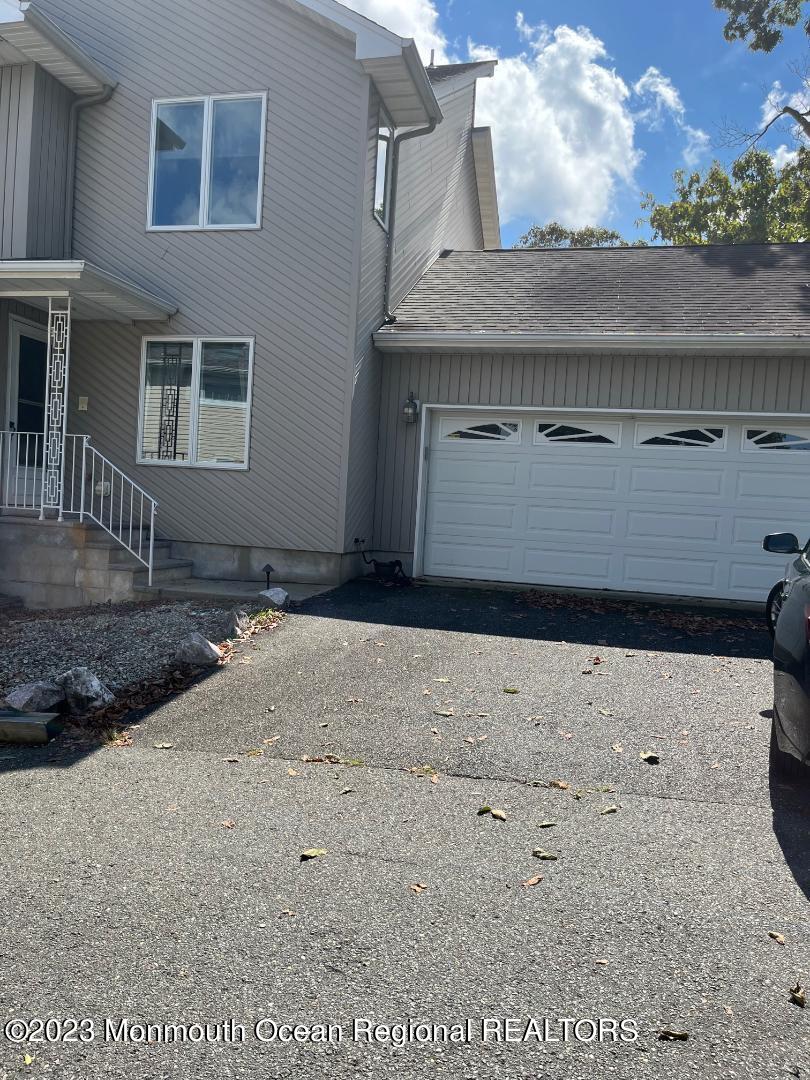 64 Van Ness Drive Brick, NJ 08723 - Photo 3 of 25 a view of a backyard of the house