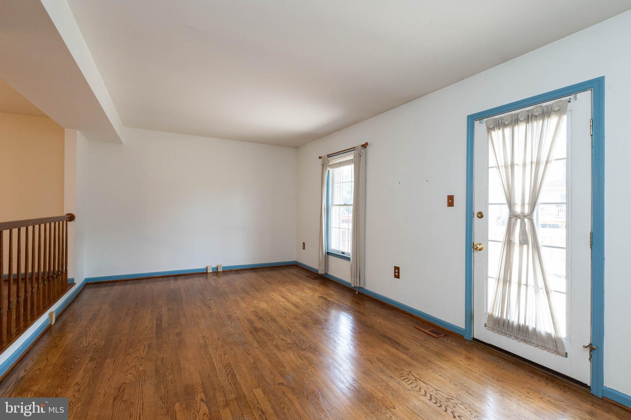 8013 Broken Reed Court Frederick, MD 21701 - Photo 10 of 37 Living Room has access to deck