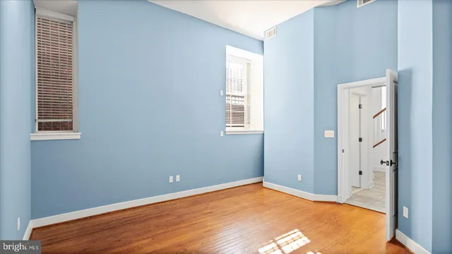 an empty room with windows