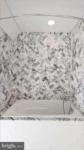 a view of snow on the road