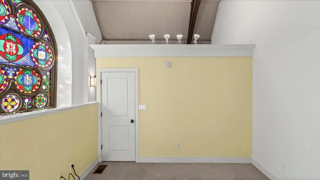 a view of hallway with stairs