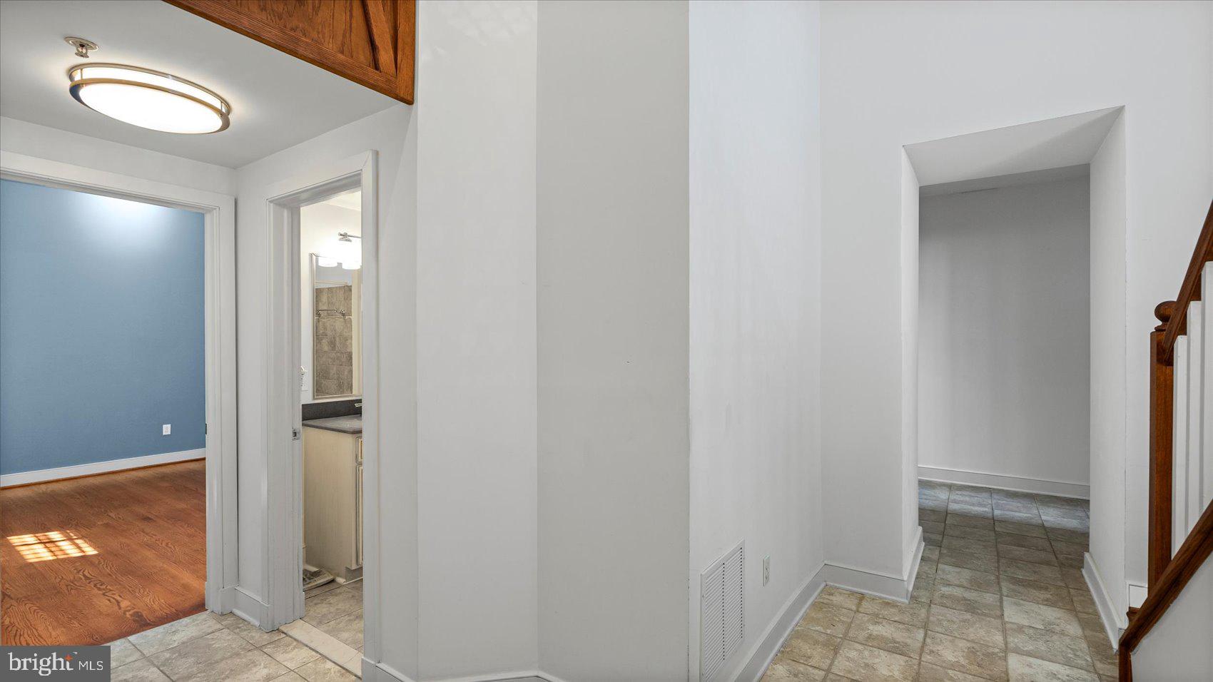 1100 North Calvert Street, Unit 2 Baltimore, MD 21202 - Photo 7 of 34 a view of a hallway with closet and bathroom view